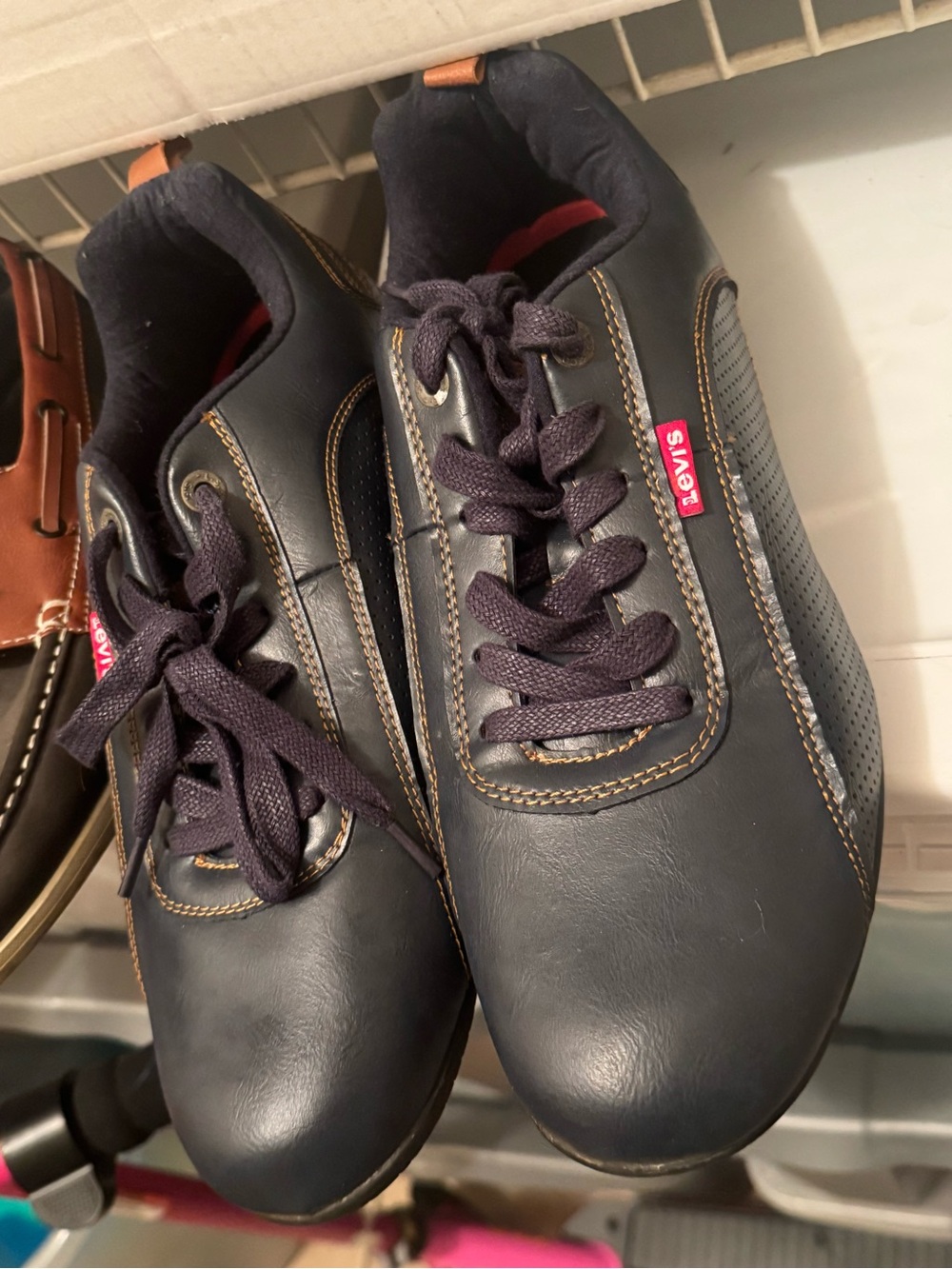 Levi's Men's Navy Sneakers with Brown Stitching and Red Tag